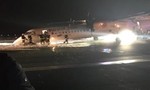 Máy bay hạ cánh bằng... bụng, 59 hành khách thoát chết