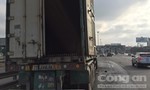 Xe container bốc cháy trước trạm thu phí cầu Đồng Nai, tài xế thoát nạn