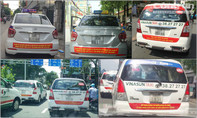 Taxi truyền thống tại TP.HCM và Hà Nội dán decal phản đối Uber, Grab